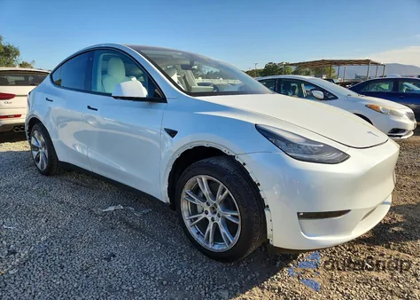 2023 Tesla Model Y z USA, uszkodzony, nr VIN 7SAYGDEE9PF614408
